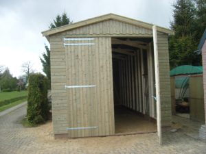 Houten caravanstalling laten bouwen